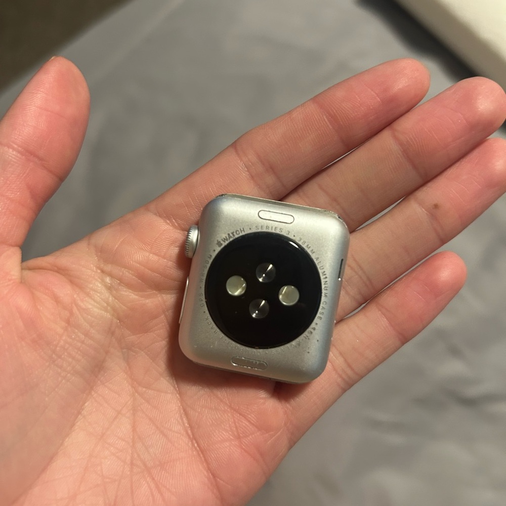 Apple Watch with Metallic Silver and Dark Sensor series 3